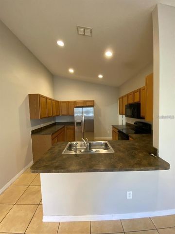 502 BLACKBIRD LANE A, Poinciana, FL 34759