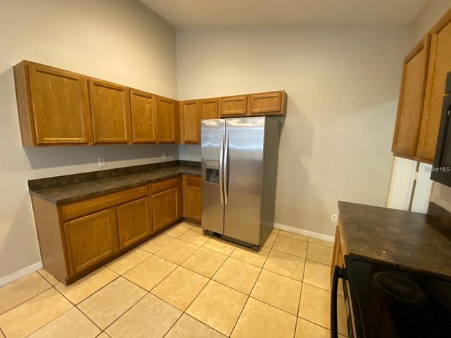 502 BLACKBIRD LANE A, Poinciana, FL 34759