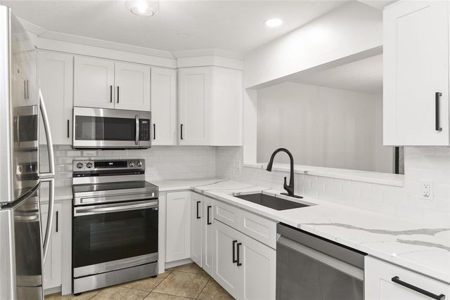 1933 SAINT ANDREWS PLACE 1933, Longwood, FL 32779