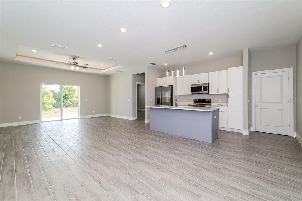 Image 5 of property listing at 1055 DESMOINES LANE, Poinciana, FL 34759