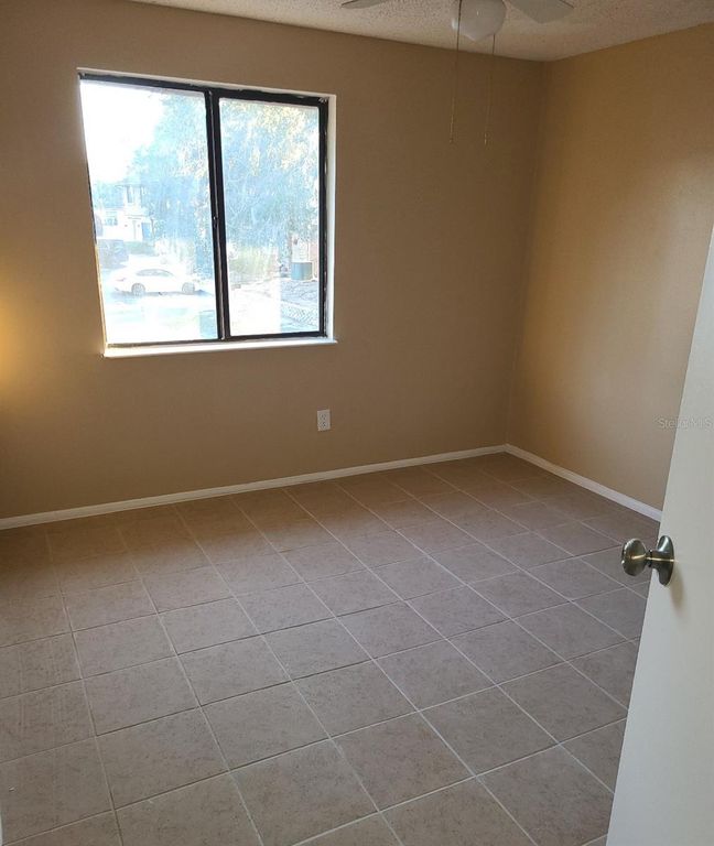 Image 16 of property listing at 4916 SILVER OAKS VLG E, Orlando, FL 32808