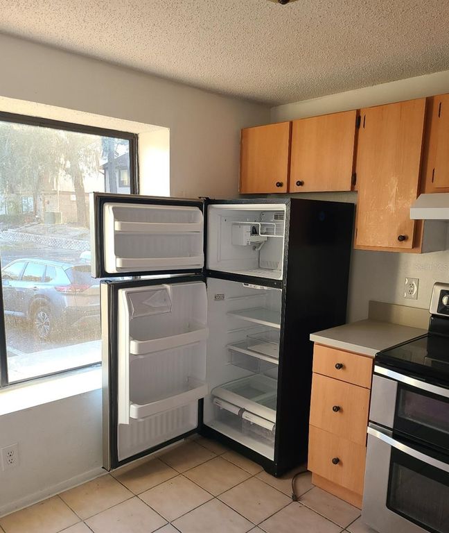 Image 3 of property listing at 4916 SILVER OAKS VLG E, Orlando, FL 32808