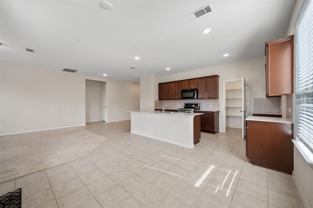 9702 Fairymoss Court, Spring, TX 77379