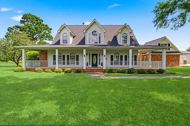 11443 Outpost Cove Drive, Willis, TX 77318