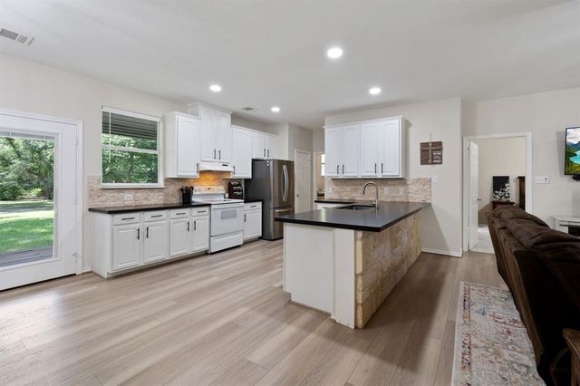 11402 Willis Waukegan Road, Conroe, TX 77303