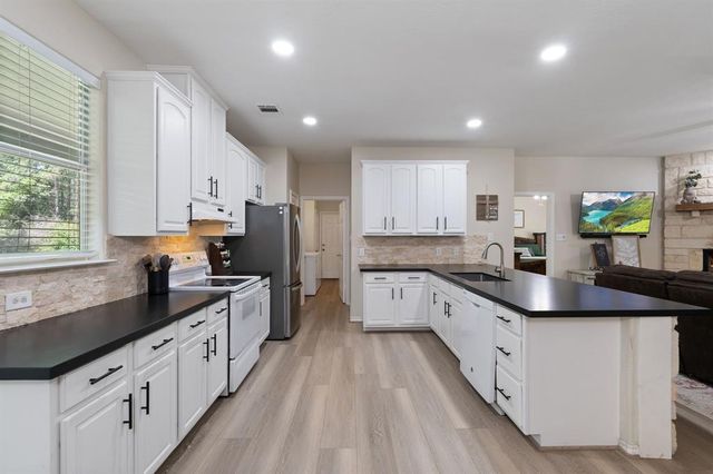 11402 Willis Waukegan Road, Conroe, TX 77303