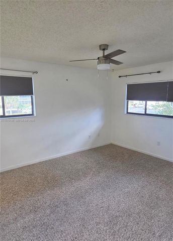 9842 Belfort Cir 214A4, Tamarac, FL 33321