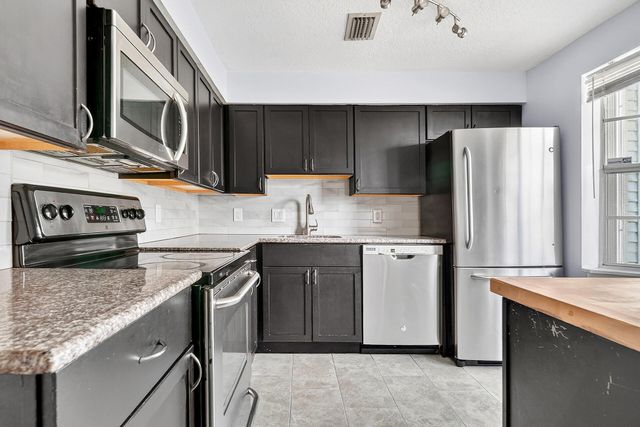 407 Georgian Park Drive, Jupiter, FL 33458