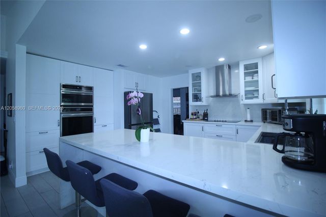 6486 Woodbury Road, Boca Raton, FL 33433