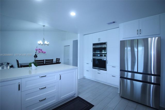 6486 Woodbury Road, Boca Raton, FL 33433