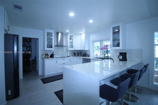 6486 Woodbury Road, Boca Raton, FL 33433