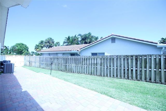6486 Woodbury Road, Boca Raton, FL 33433