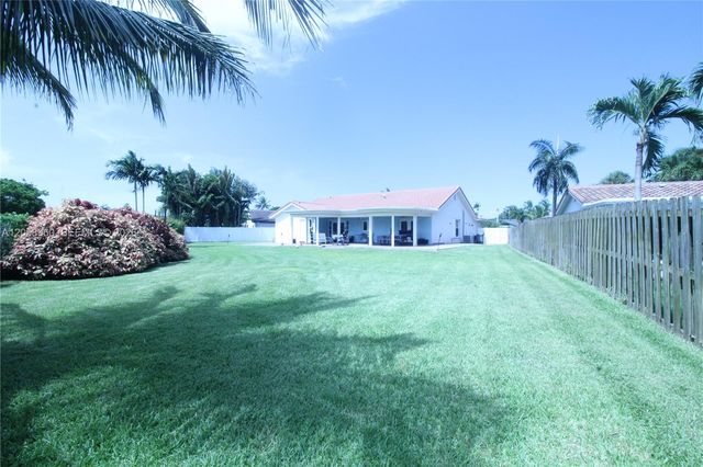 6486 Woodbury Road, Boca Raton, FL 33433
