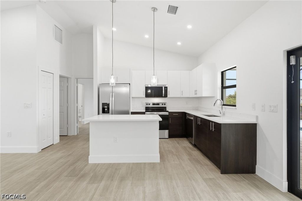 Image 8 of property listing at 1431 NW 17th AVE, Cape Coral, FL 33993