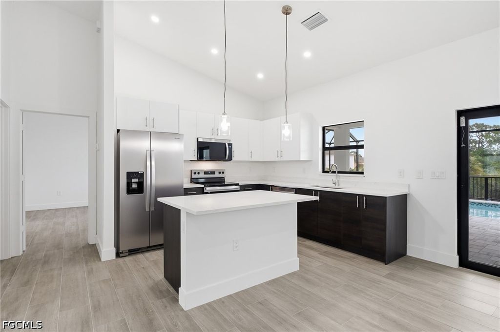 Image 9 of property listing at 1431 NW 17th AVE, Cape Coral, FL 33993