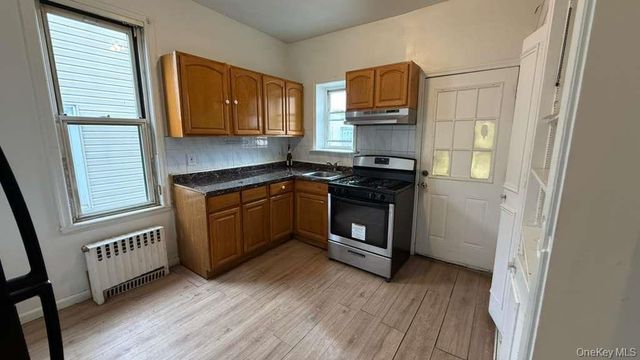 3023 83rd Street, East Elmhurst, NY 11370