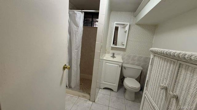 3023 83rd Street, East Elmhurst, NY 11370