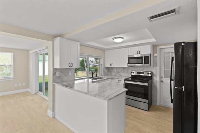 3317 HONEYMOON LANE, Holiday, FL 34691