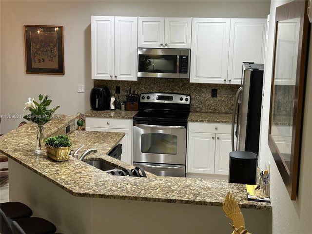 4745 N Grand Cypress Circle N, Coconut Creek, FL 33073