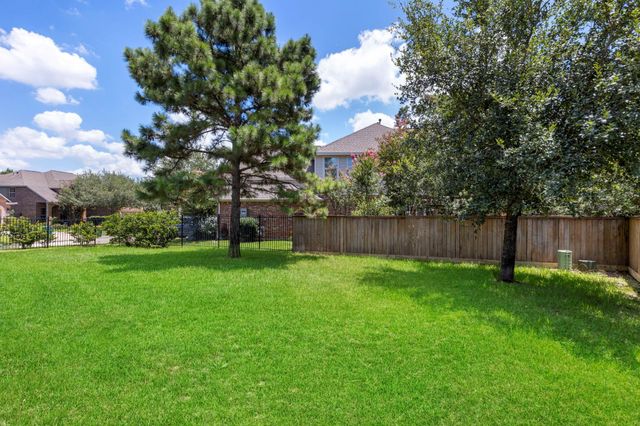 10 Loxanhachee Place, Spring, TX 77389