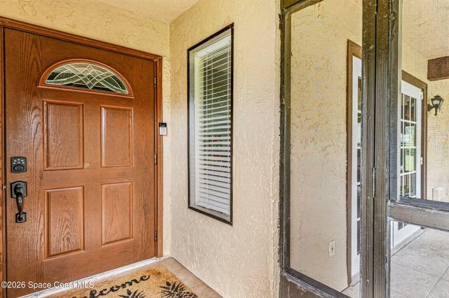1557 Waldorf Circle NE, Palm Bay, FL 32905
