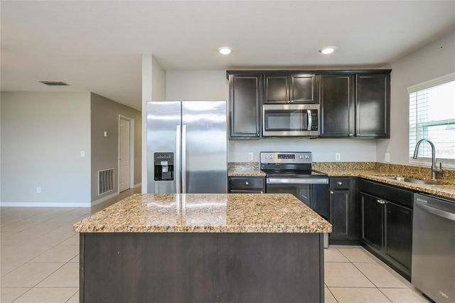 1740 CANAAN LOOP, Dundee, FL 33838