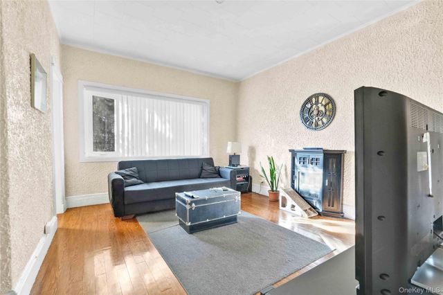 9717 90th Street, Ozone Park, NY 11416