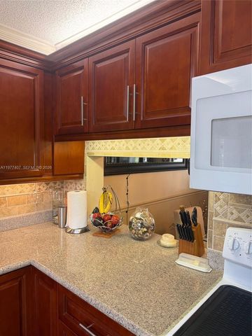 4940 E Sabal Palm Blvd 203, Tamarac, FL 33319