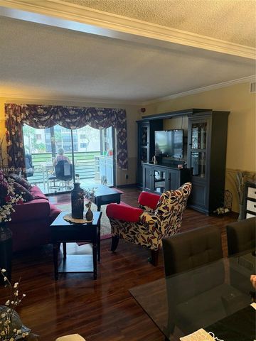 4940 E Sabal Palm Blvd 203, Tamarac, FL 33319