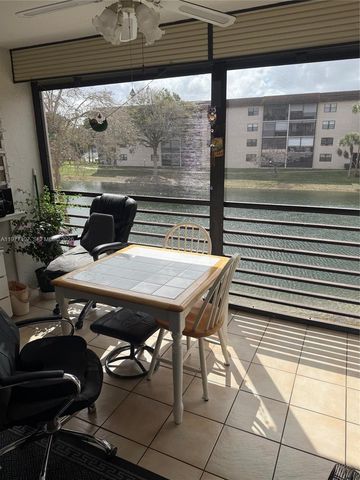 4940 E Sabal Palm Blvd 203, Tamarac, FL 33319