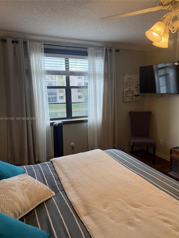 4940 E Sabal Palm Blvd 203, Tamarac, FL 33319