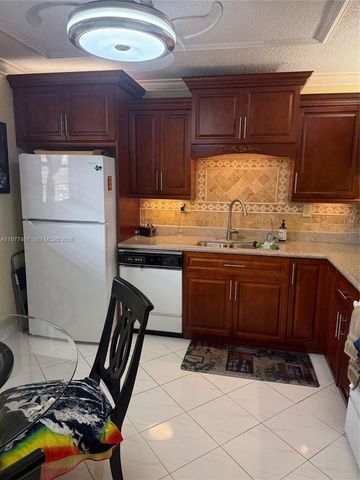 4940 E Sabal Palm Blvd 203, Tamarac, FL 33319