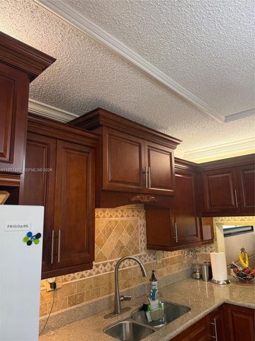 4940 E Sabal Palm Blvd 203, Tamarac, FL 33319