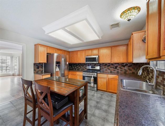 25719 Bearborough Drive, Spring, TX 77386