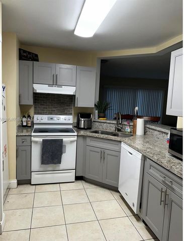 3433 NW 44th Street 105, Oakland Park, FL 33309