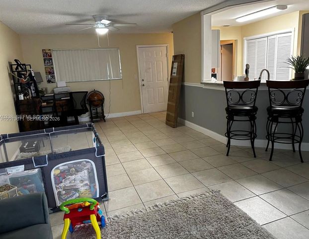 3433 NW 44th Street 105, Oakland Park, FL 33309