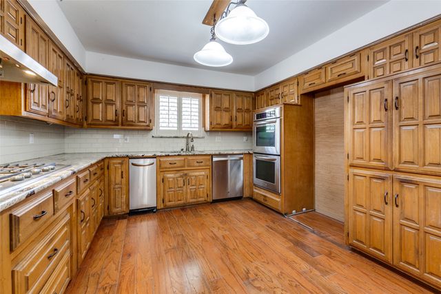 12605 Whispering Hills Drive, Dallas, TX 75243