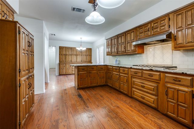 12605 Whispering Hills Drive, Dallas, TX 75243