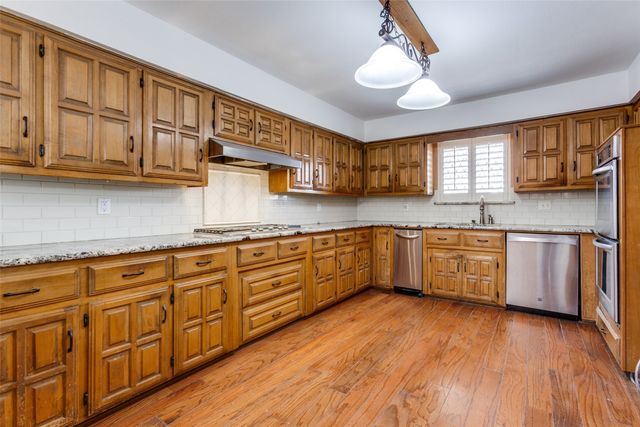 12605 Whispering Hills Drive, Dallas, TX 75243