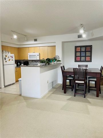 8020 N NOB HILL Road 206, Tamarac, FL 33321