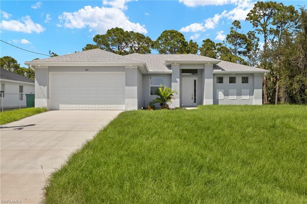 3112 16th ST W, LEHIGH ACRES, FL 33971 — photo 2