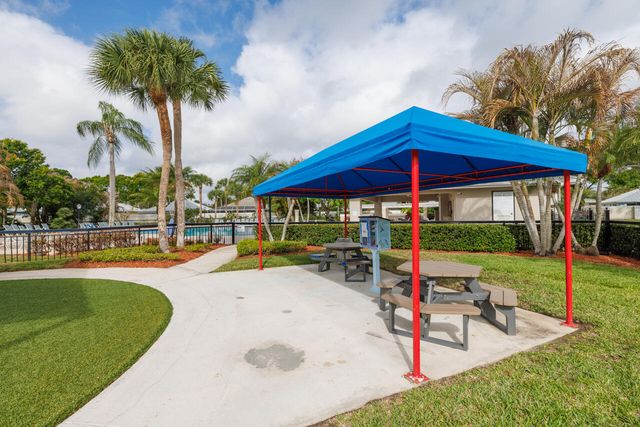 1560 SW Waterfall Boulevard, Palm City, FL 34990