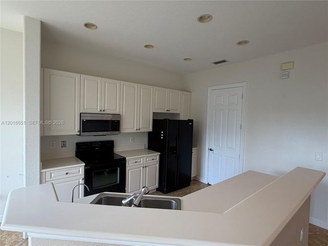 8344 NW 127th Ln 26-F, Parkland, FL 33076