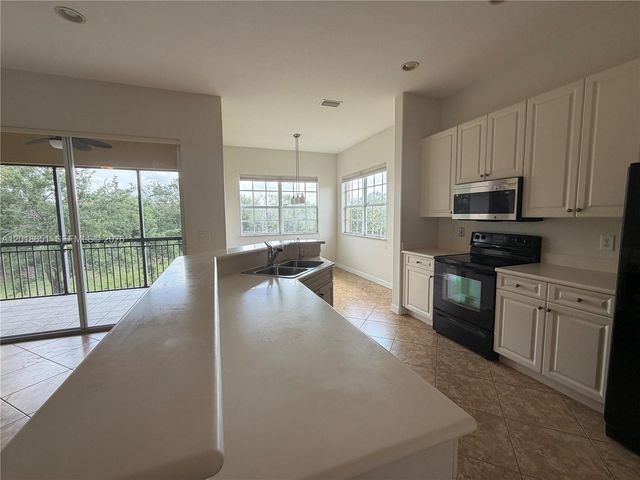 8344 NW 127th Ln 26-F, Parkland, FL 33076