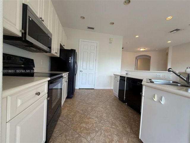 8344 NW 127th Ln 26-F, Parkland, FL 33076