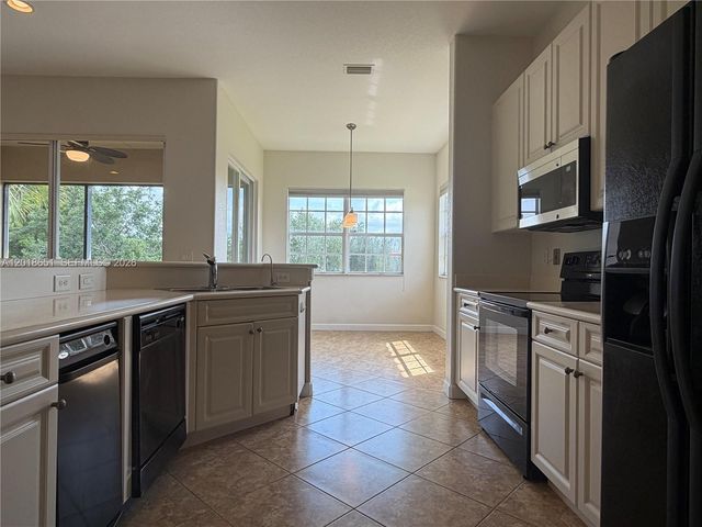 8344 NW 127th Ln 26-F, Parkland, FL 33076