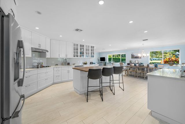 413 S Country Club Drive, Atlantis, FL 33462