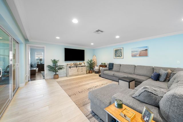 413 S Country Club Drive, Atlantis, FL 33462