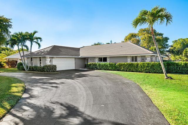 413 S Country Club Drive, Atlantis, FL 33462