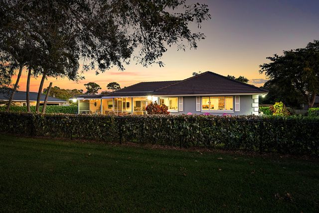 413 S Country Club Drive, Atlantis, FL 33462